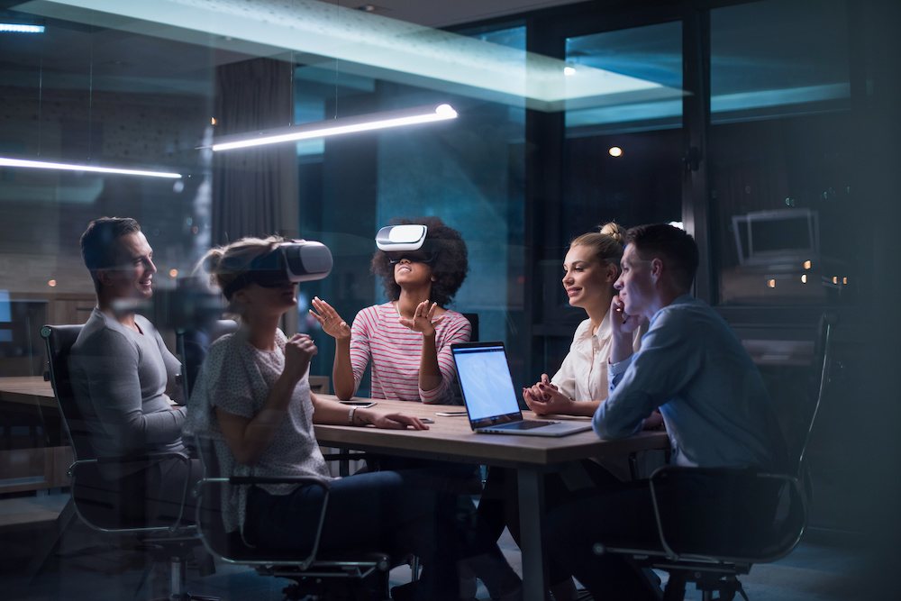 virtual reality technology being used by office team